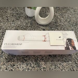 T3 Curl Wrap 1.25" Automatic
Rotating Curling Iron with Long Barrel-used twice